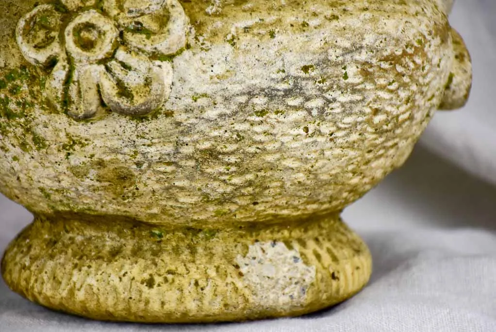 Pair of concrete flower pots decorated with pomegranates