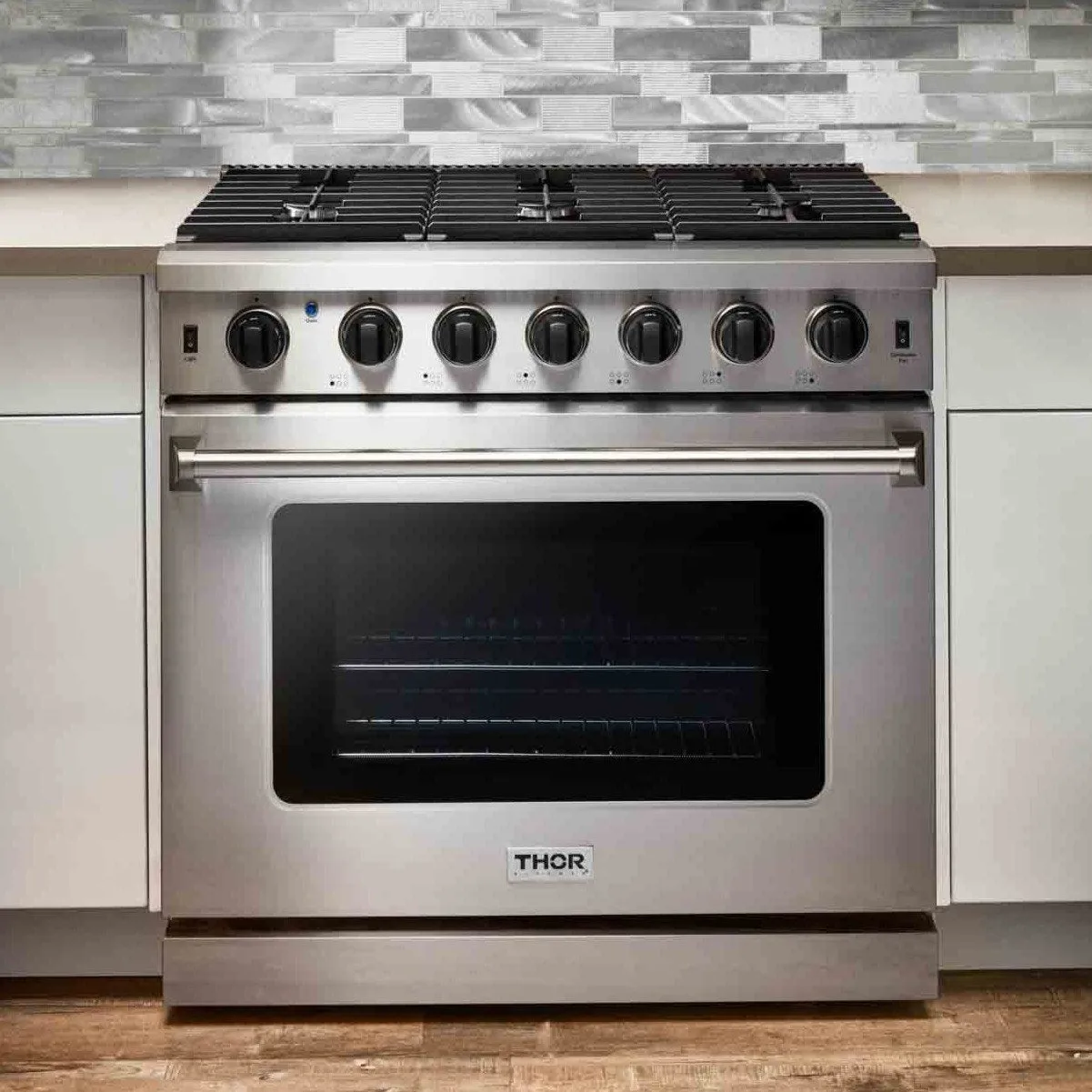 Thor Kitchen 4-Piece Appliance Package - 36-Inch Gas Range, French Door Refrigerator, Pro-Style Wall Mount Hood, and Dishwasher in Stainless Steel